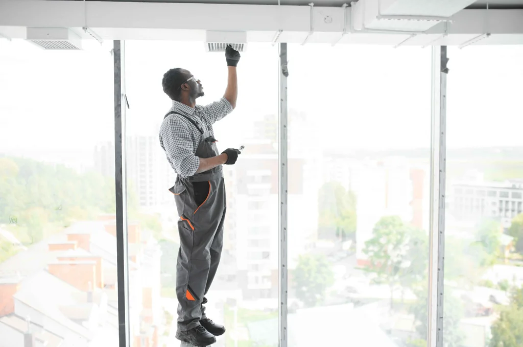 african-hvac-technician-worker-testing-newly-insta-2025-03-15-03-43-16-utc_11zon